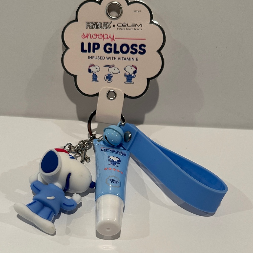 NWT Peanuts x Celavi Snoopy Lip Gloss w/ Vit E and Key Chain with Bag Charm.